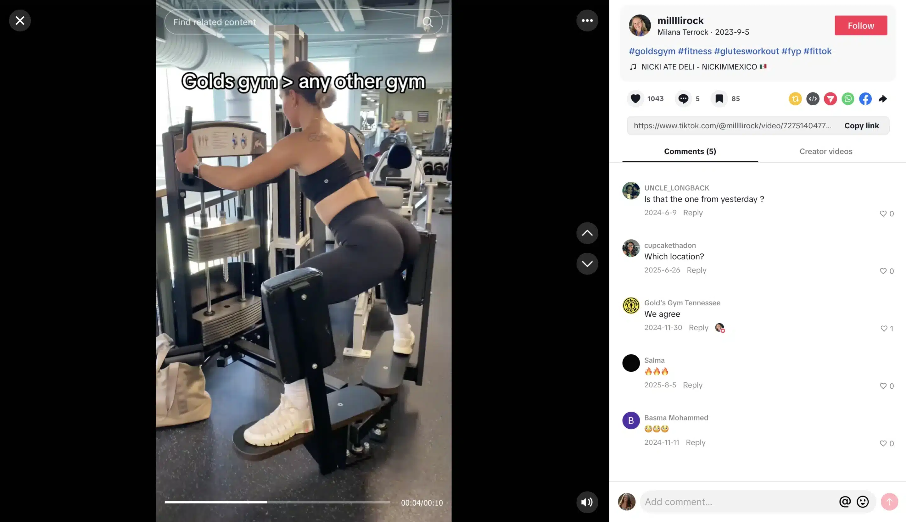 Woman in black sports bra and leggings performing a glute exercise on a machine at Gold’s Gym, viewed from behind, with weight stacks and cardio equipment in the background; shown within a TikTok video interface with caption, hashtags, music credit, and comments visible on the right.