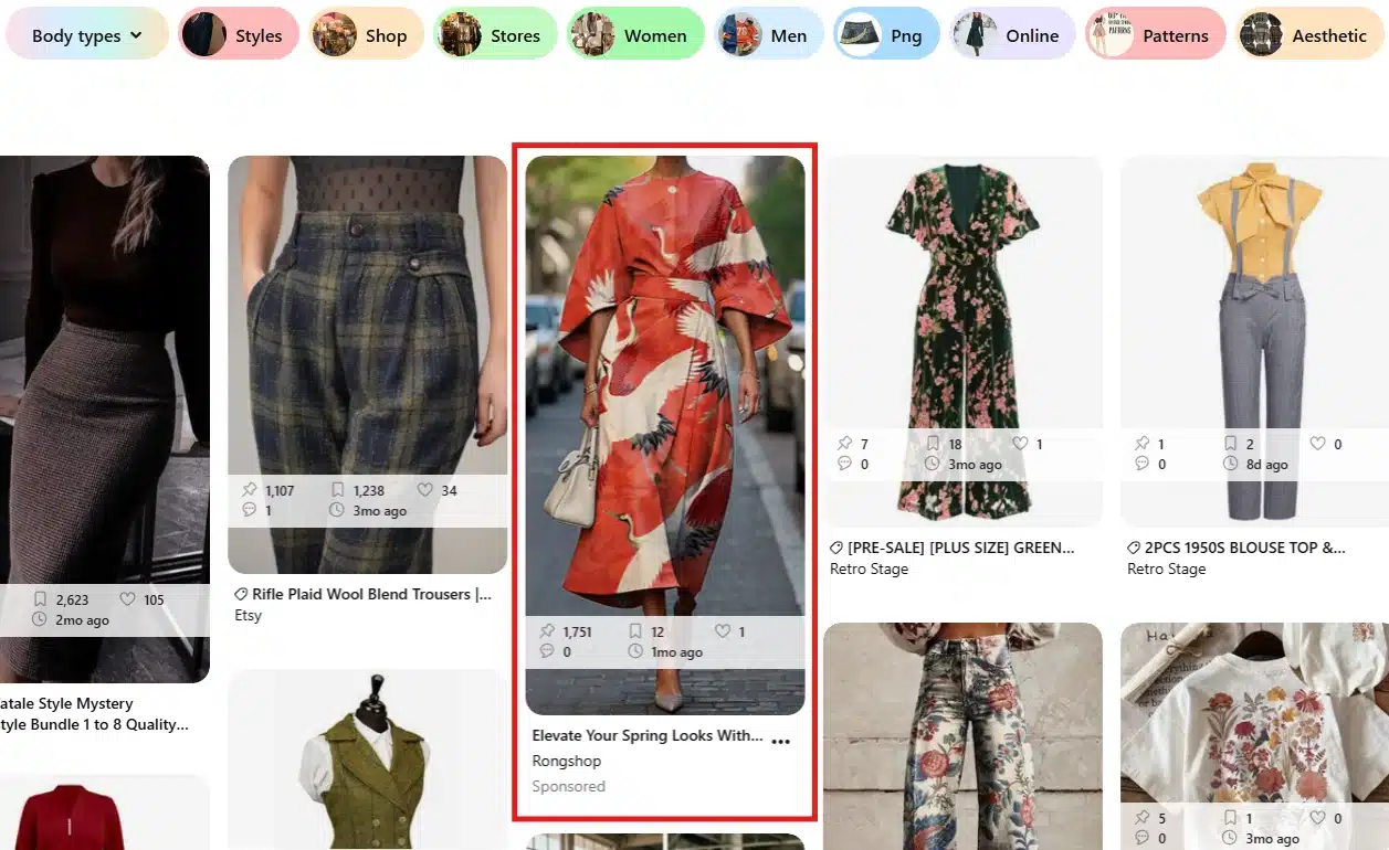 Pinterest search results page displaying clothing and fashion Pins, with a sponsored apparel advertisement highlighted among organic Pins in the feed.