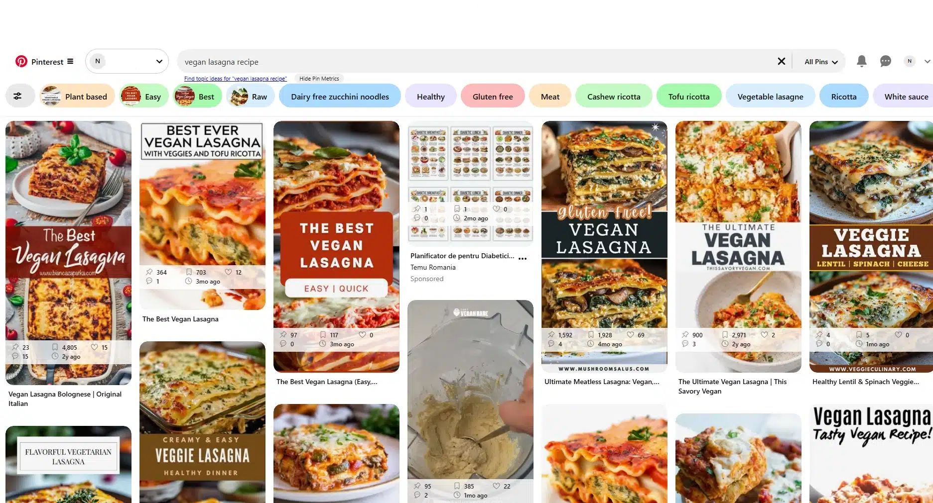 Pinterest search results page for the query “vegan lasagna recipe.” The interface displays a grid of recipe Pins featuring photos of vegan lasagna dishes, cooking guides, and meal ideas. Related topic filters appear across the top, including options such as plant-based, gluten-free, healthy, tofu ricotta, cashew ricotta, and vegetable lasagne. The results showcase how Pinterest organizes content discovery through visual search results and keyword-based topic suggestions.