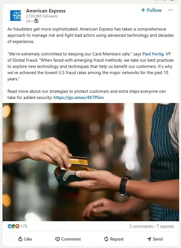 A close-up image of one person handing a credit card to another in a warm-toned environment, accompanying a LinkedIn post from American Express discussing fraud protection strategies.