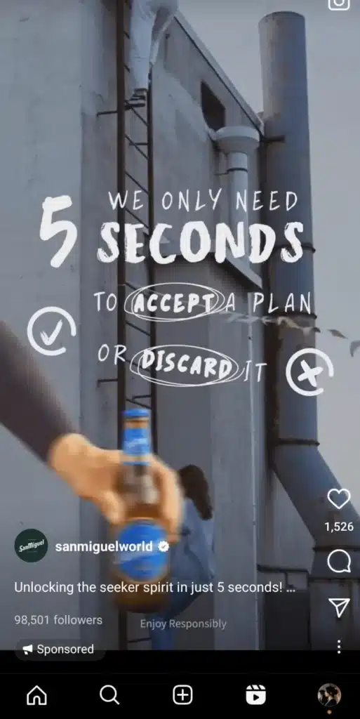  Instagram reel ad by San Miguel beer showing a person climbing a ladder with the text “We only need 5 seconds to accept a plan or discard it.” The bottle is held in the foreground and the account handle is @sanmiguelworld.