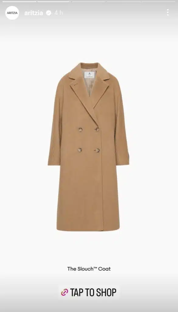 Shop tag for Aritzia coat in Story