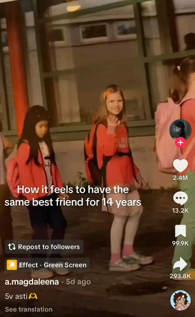 TikTok post showing two little girls with backpacks outside a school, captioned 'How it feels to have the same best friend for 14 years.