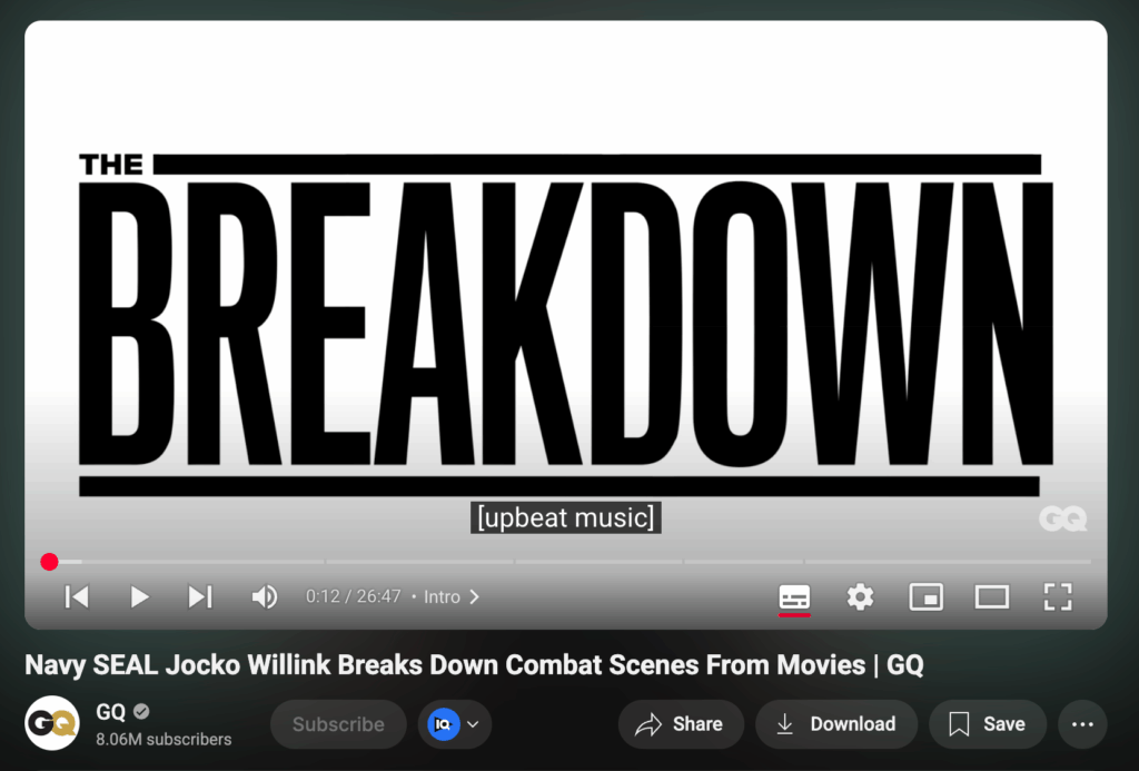 YouTube video screenshot from GQ’s channel showing the intro title card 'THE BREAKDOWN' in bold black letters on a white background.