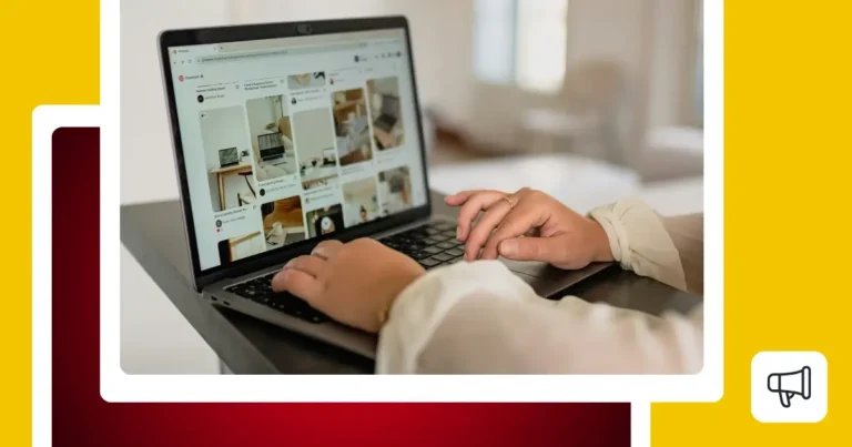 Close-up of a person using a laptop with Pinterest open, browsing home decor and workspace ideas.