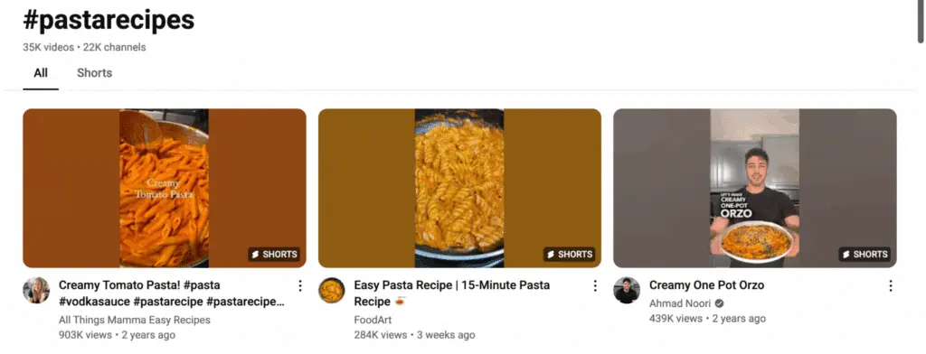 YouTube hashtag page for #pastarecipes showing videos including creamy tomato pasta, a 15-minute pasta recipe, and creamy one pot orzo, with millions of views displayed under each video thumbnail.