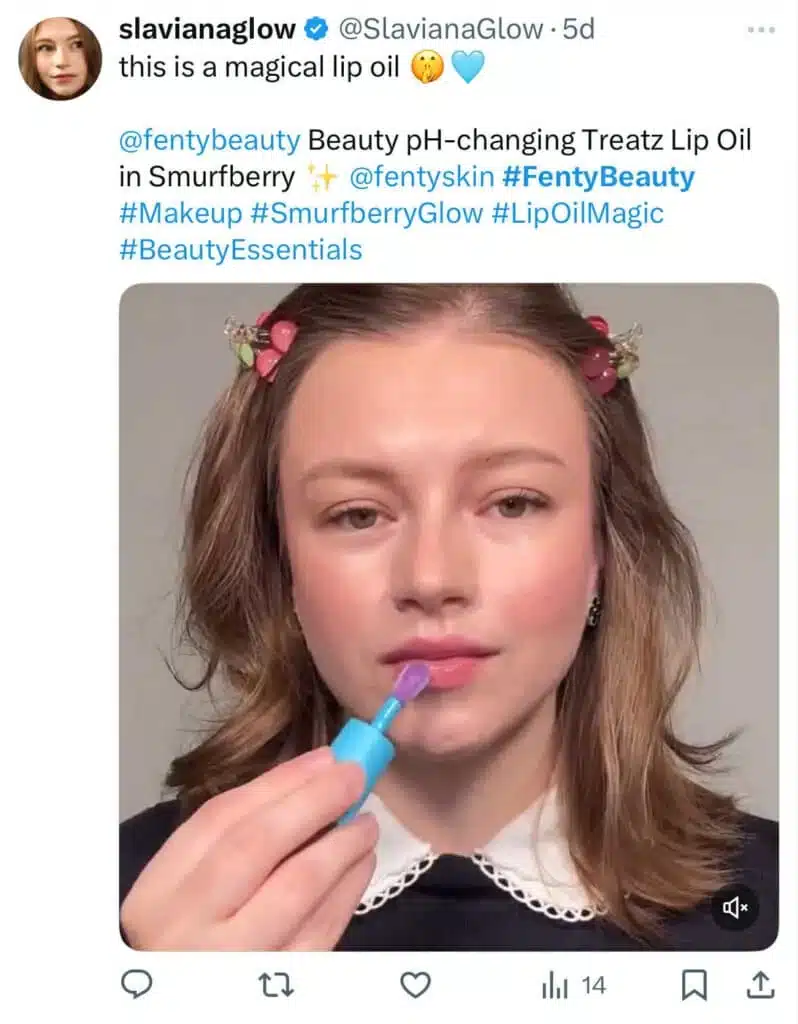 A tweet from @SlavianaGlow promoting Fenty Beauty’s pH-changing Treatz Lip Oil in Smurfberry, tagged with multiple hashtags like #FentyBeauty and #Makeup.