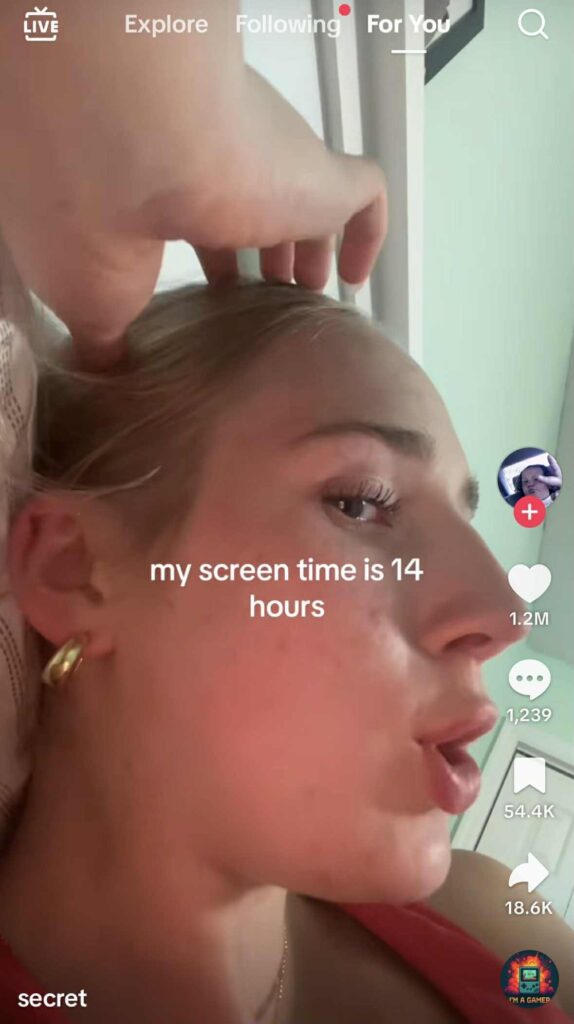 A woman lying down with text overlay that reads ‘my screen time is 14 hours.’