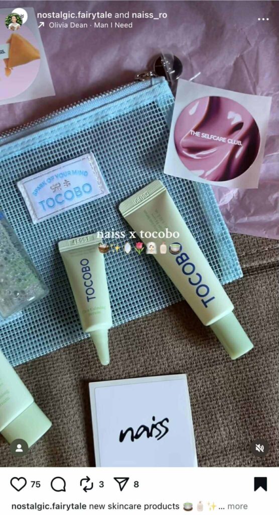 Instagram Reel post showing a flat lay of skincare products from Tocobo, including two pastel green tubes and a blue mesh pouch, alongside stickers and a Naiss-branded card. The overlay text reads ‘naiss x tocobo.’