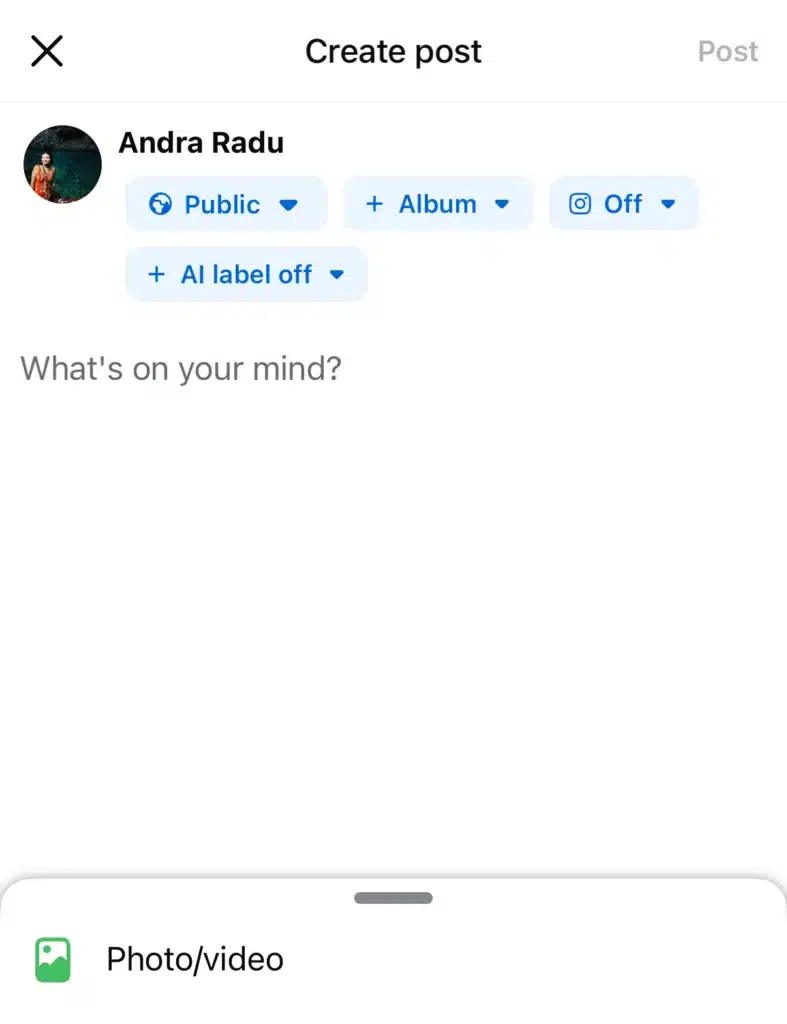 Mobile Facebook post creation screen for user Andra Radu with “What’s on your mind?” prompt and an option to add a photo or video at the bottom.