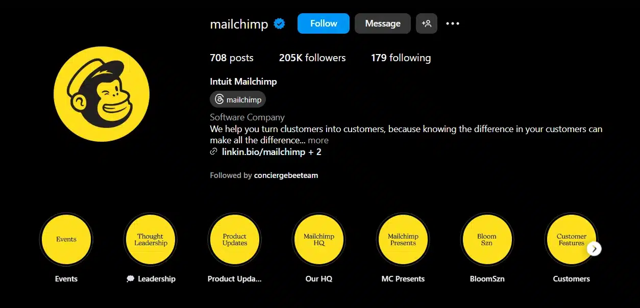 Instagram profile of Mailchimp with a dark-themed layout, featuring yellow story highlight icons labeled Events, Leadership, Product Updates, Mailchimp HQ, Mailchimp Presents, BloomSzn, and Customers.