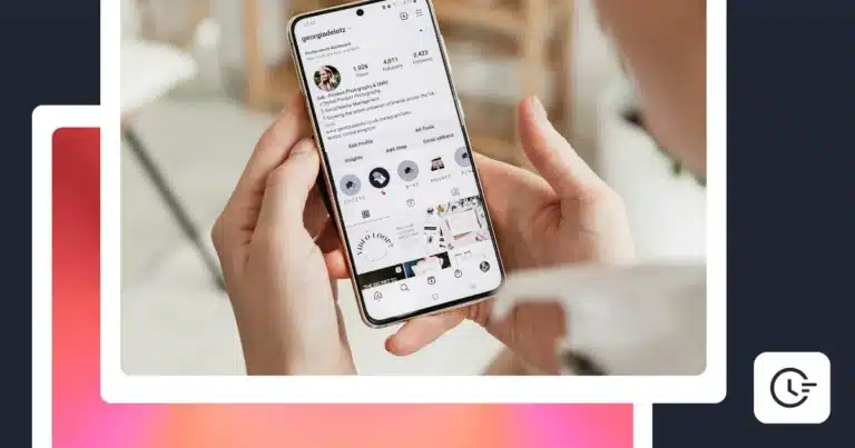 Hands holding a smartphone displaying an Instagram profile.