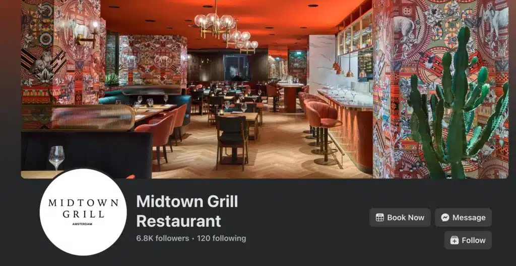 Stylish restaurant interior with warm lighting, patterned walls, bar seating, and dining tables, showcasing the atmosphere of Midtown Grill Restaurant.