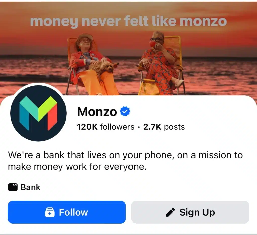 Monzo Facebook page cover image featuring two older people relaxing by the sea at sunset with the text ‘money never felt like monzo’