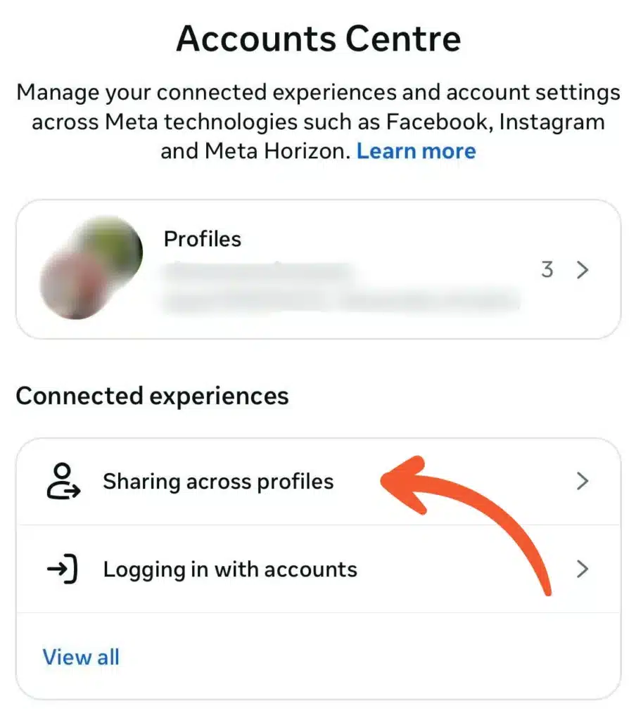 Meta Accounts Centre screen in Instagram settings showing “Profiles” and “Sharing across profiles” under Connected experiences, with an arrow pointing to the sharing option.