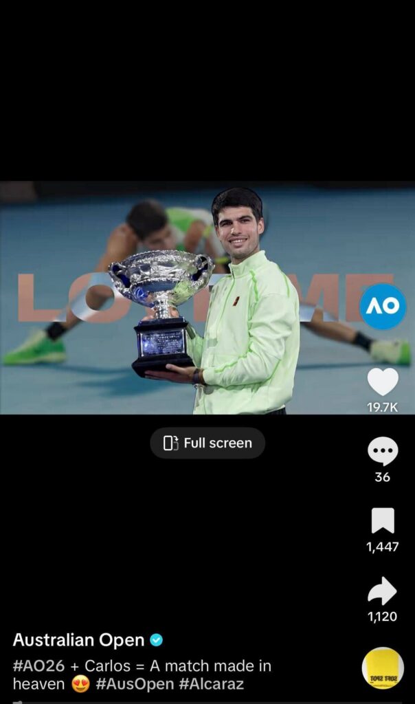 TikTok video screenshot of Carlos Alcaraz smiling and holding the Australian Open trophy on a tennis court, with the AO logo visible and engagement icons on the right side of the screen.