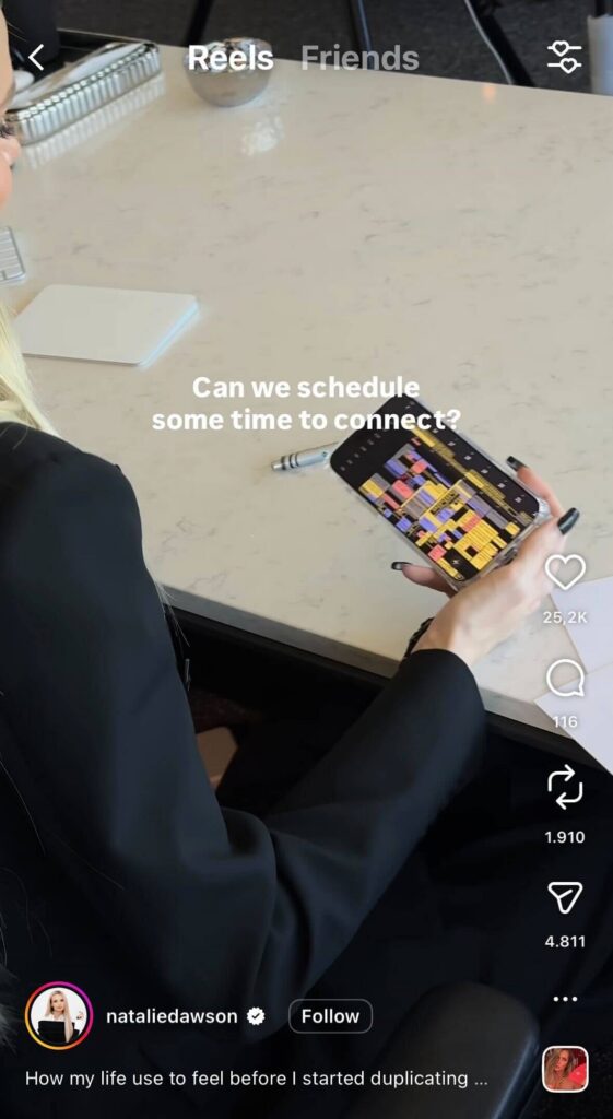 Instagram Reel of a woman holding a phone showing a busy calendar with text that says, “Can we schedule some time to connect?”