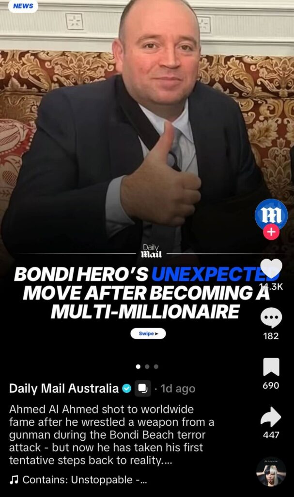 Man in a suit giving a thumbs-up, featured in a Daily Mail Australia TikTok slideshow about the Bondi Beach hero becoming a multi-millionaire.