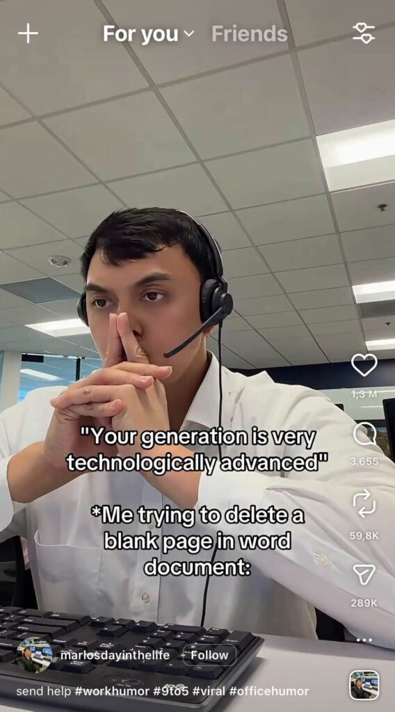 Man wearing a headset at a desk, looking confused at a computer. Overlaid text reads “Your generation is very technologically advanced” followed by “me trying to delete a blank page in Word document.”
