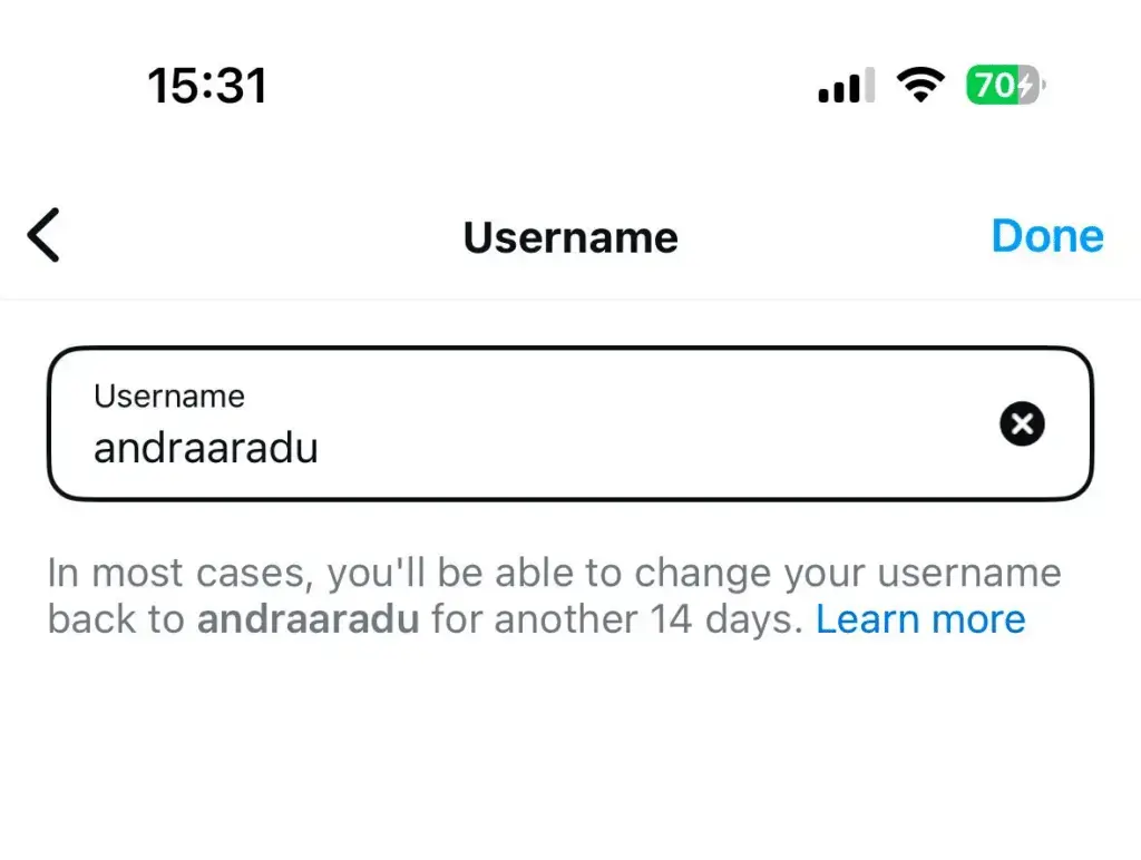 Instagram mobile screen for changing username, showing the handle “andraaradu” with a note that the username can be changed back within 14 days.