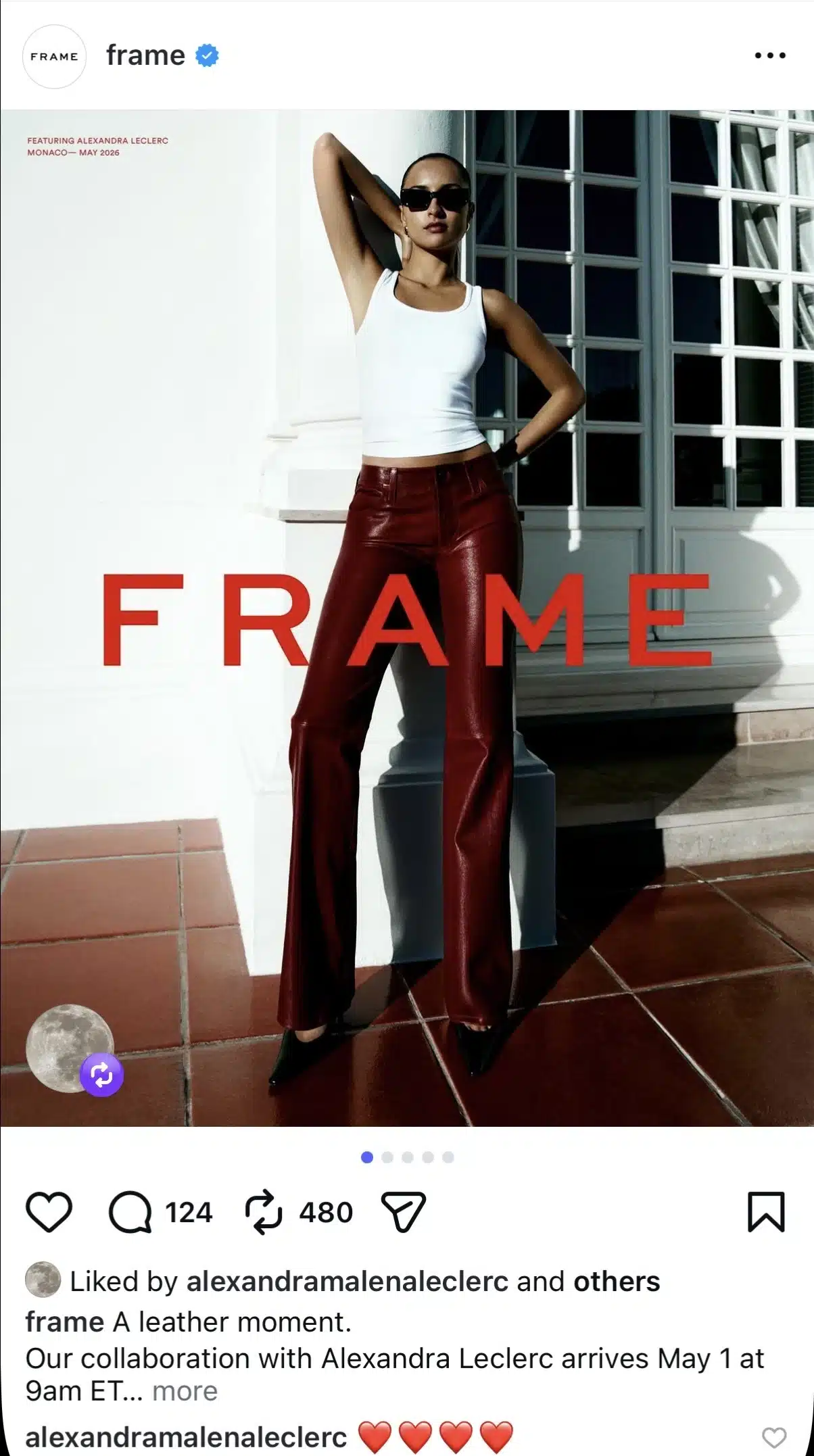 A fashion advertisement featuring a woman posing outdoors beside white columns and large window panes. She wears black sunglasses, a white sleeveless tank top, high-waisted dark red leather pants, and pointed black heels. Large red text reading “FRAME” overlays the center of the image. Instagram interface elements and account information are visible.