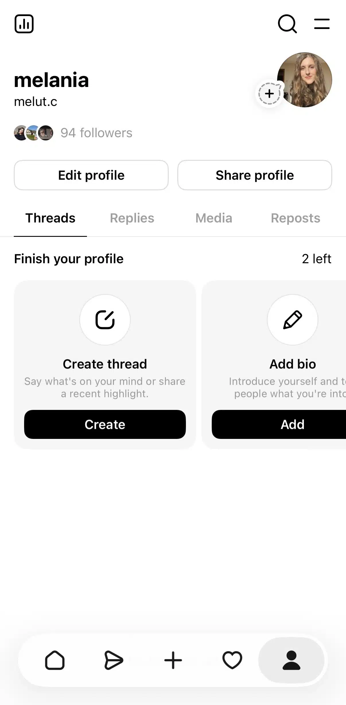 Threads profile page showing a user profile with profile photo, follower count, Edit Profile and Share Profile buttons, content tabs, and profile completion prompts for creating a thread and adding a bio.