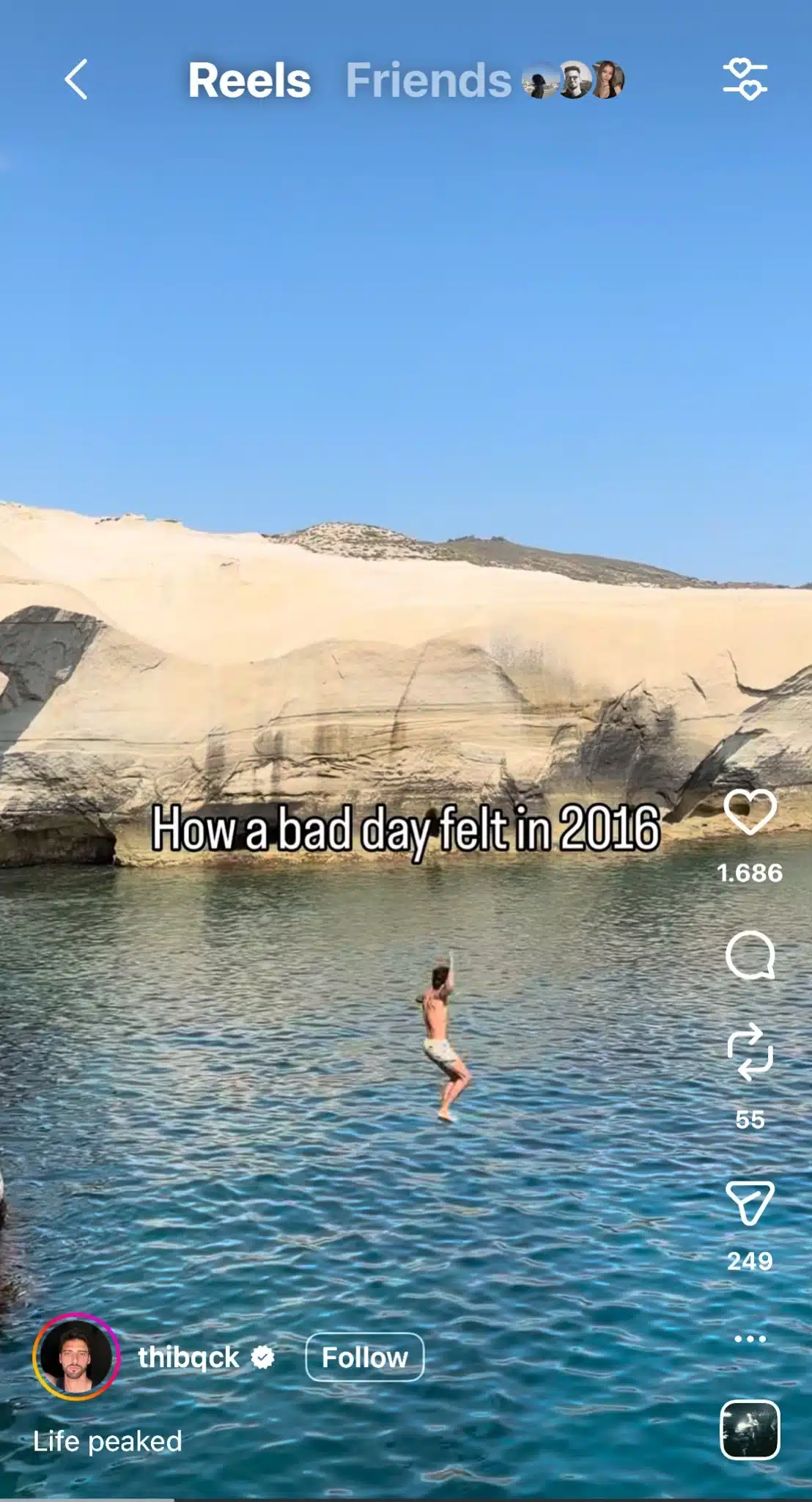 Instagram Reel showing a person jumping into clear blue water surrounded by rocky cliffs, with on-screen text reading, "How a bad day felt in 2016." The Reel uses the viral nostalgia trend to compare carefree memories from the past with present-day experiences.