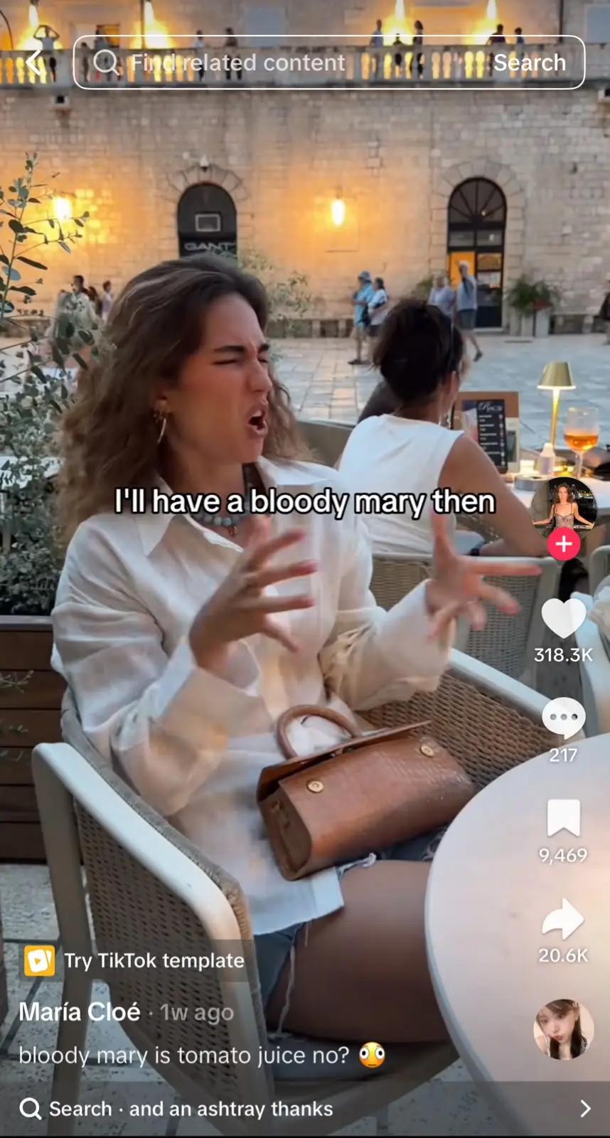 TikTok video showing a woman seated at an outdoor restaurant saying, "I'll have a Bloody Mary then," as part of a dialogue-based trend filmed in a casual dining setting.