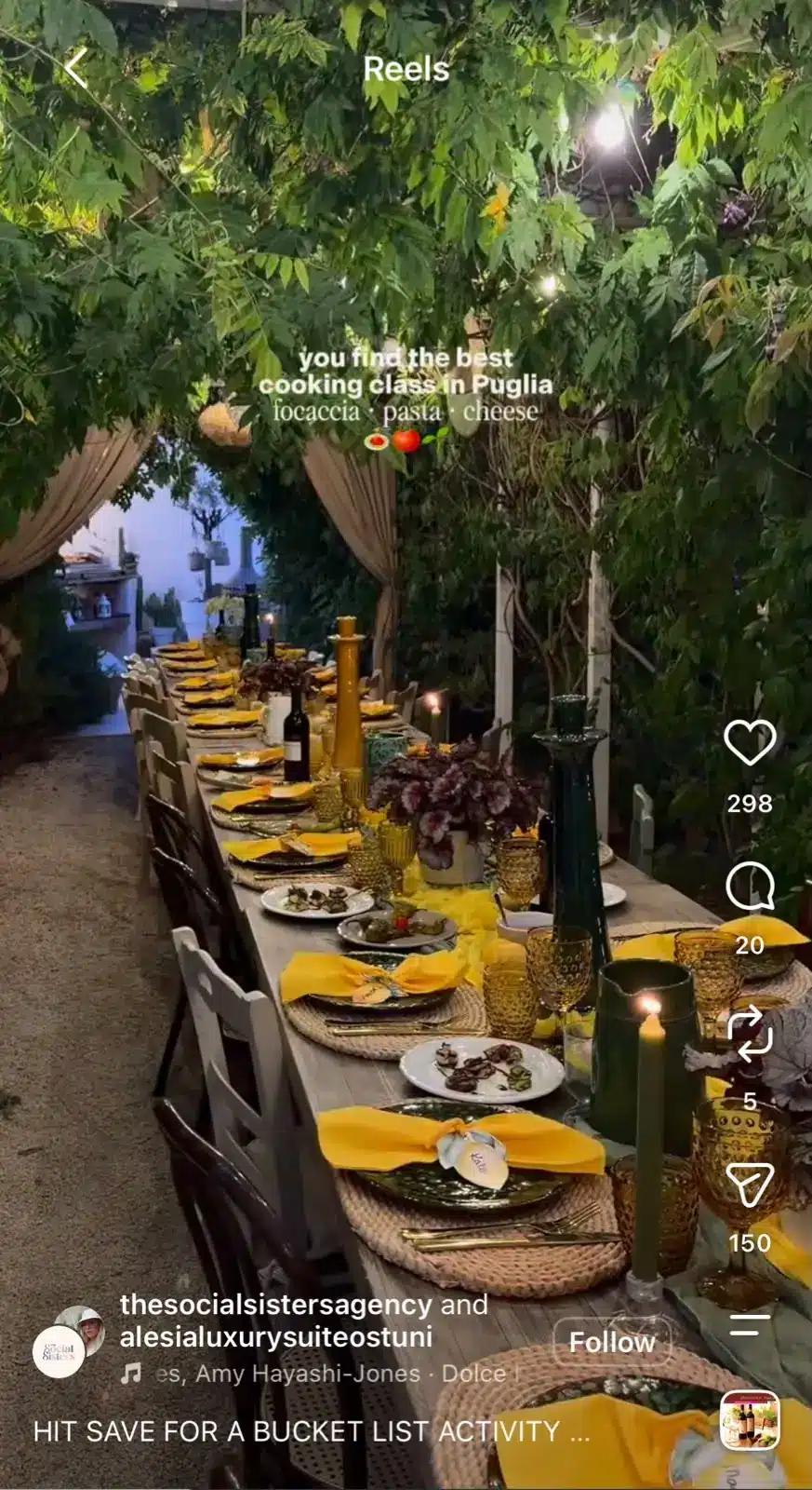 Instagram Reel showing a long outdoor dining table set beneath trees. Text on screen reads, "you find the best cooking class in Puglia," followed by "focaccia · pasta · cheese," showcasing an Italian dining experience.