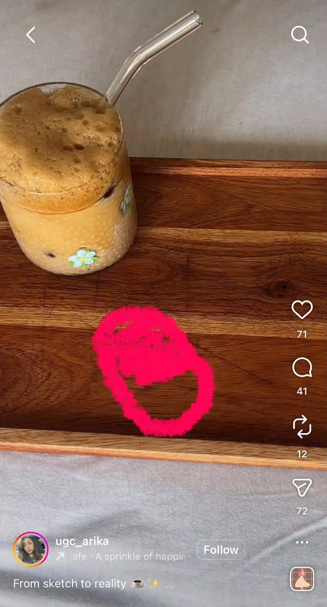 Instagram Reel showing a simple hand-drawn sketch on a wooden tray beside an iced coffee. The reel demonstrates the "sketch to create" trend by transforming the drawing into a realistic object.