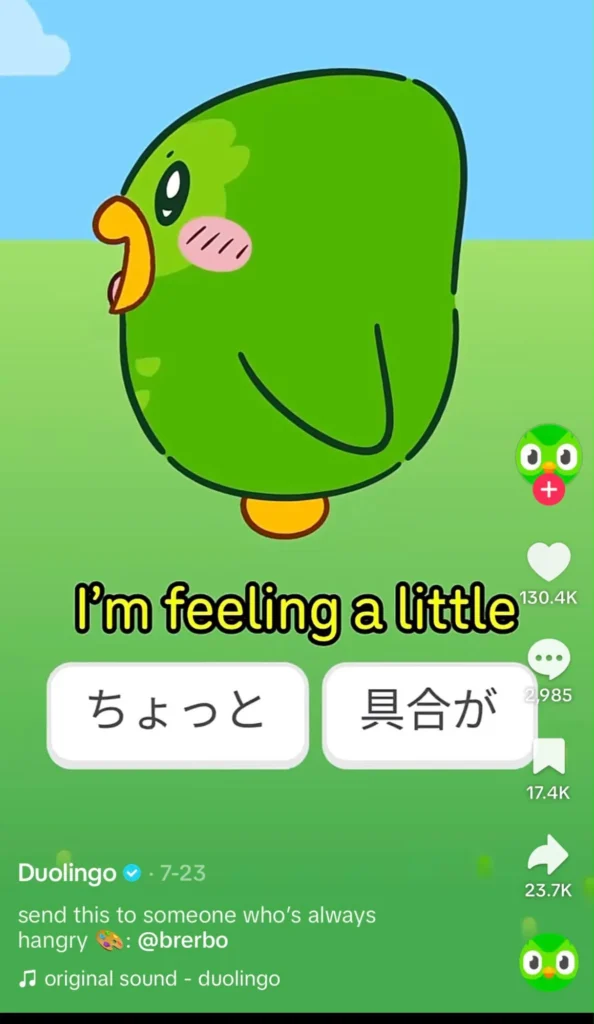 Animated Duolingo owl in a TikTok language lesson teaching a Japanese phrase with playful visuals.