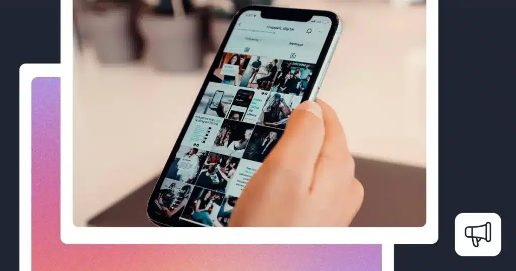 Close-up of a person holding a smartphone displaying an Instagram profile with a grid of posts. The image is framed within a white border on a dark background with pink and purple gradient accents, alongside a megaphone icon in the bottom-right corner.