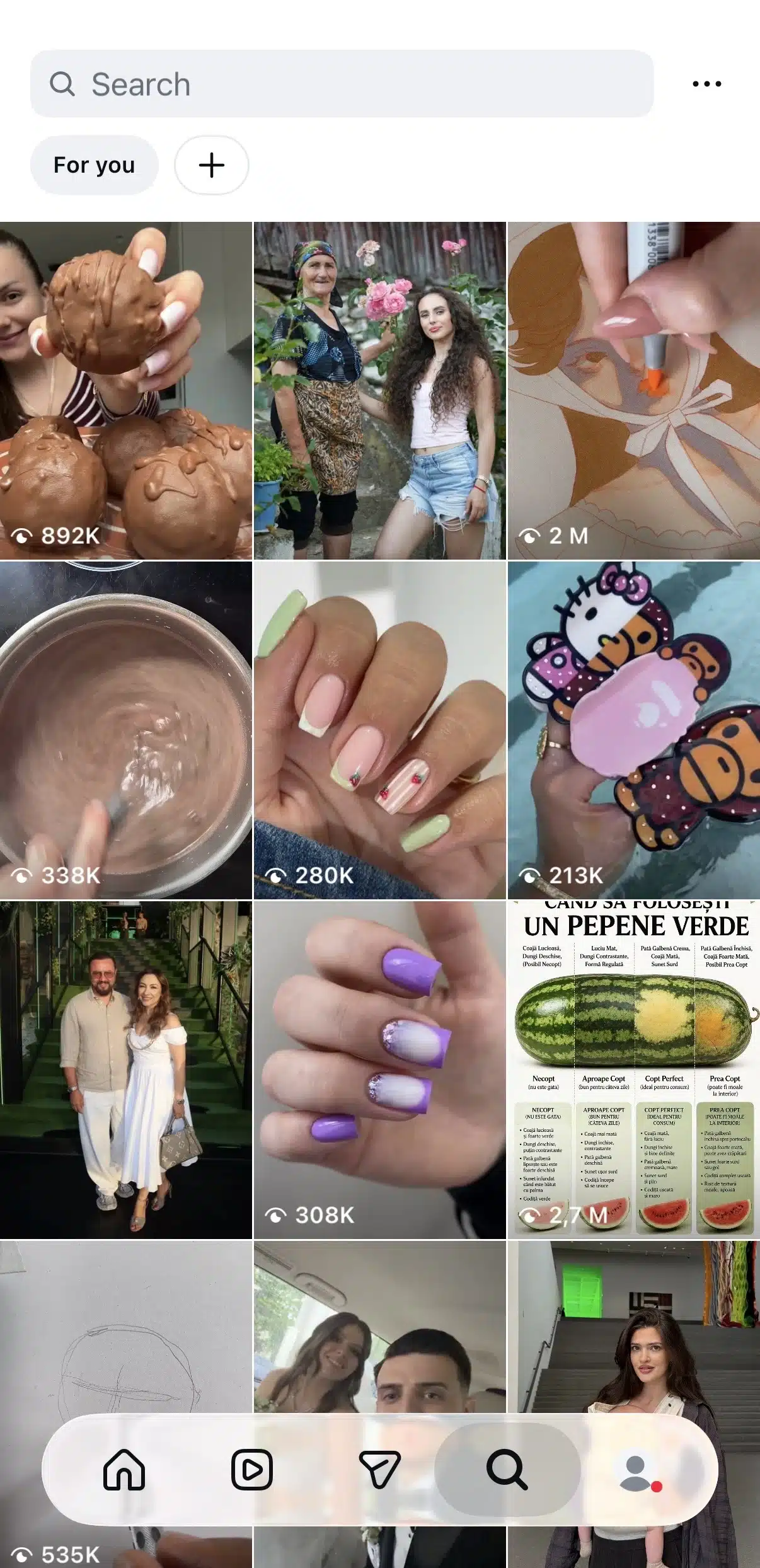 Instagram Explore page featuring a search bar at the top and a grid of recommended photos and Reels. The content includes beauty, art, lifestyle, DIY, and entertainment posts, with the bottom navigation highlighting the Search tab.