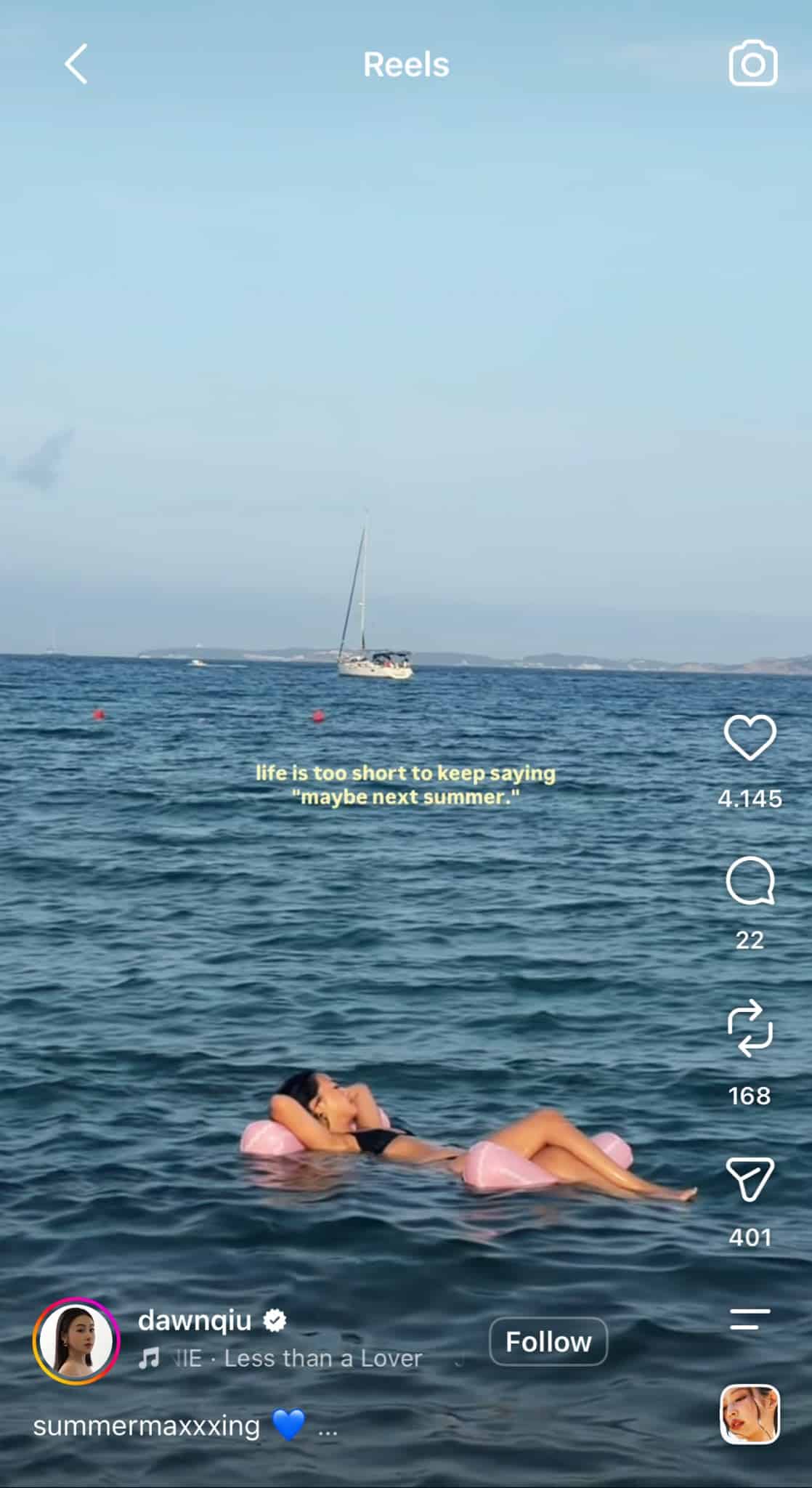 Instagram Reel from @dawnqiu showing a woman relaxing on a pink float in the sea, with the text “life is too short to keep saying ‘maybe next summer.’”