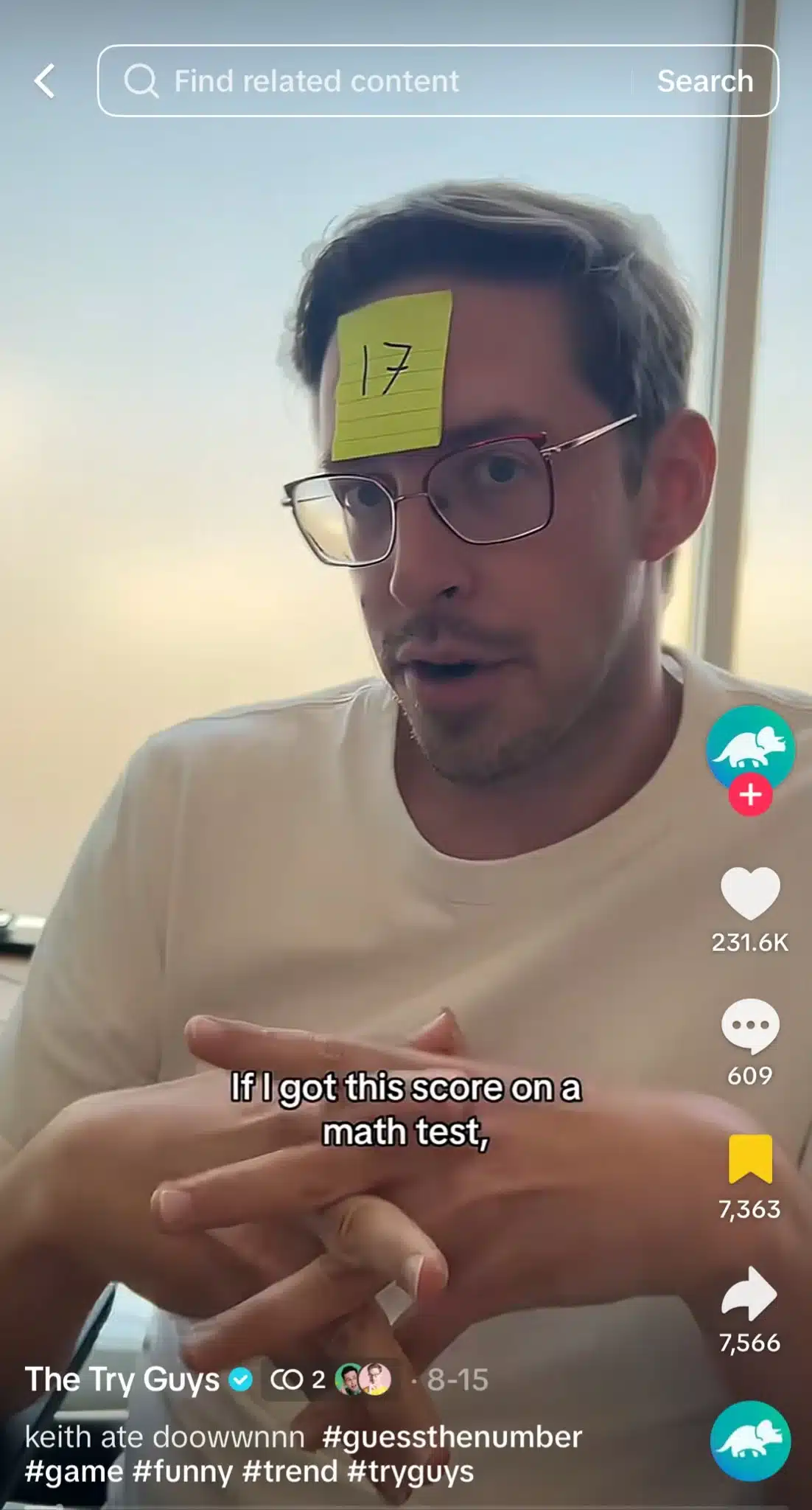 TikTok from The Try Guys showing a man wearing glasses with a sticky note marked “17” on his forehead while playing a number-guessing game.