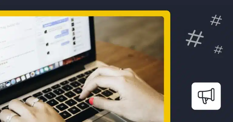 Hands typing on a laptop beside hashtag symbols and a megaphone icon.