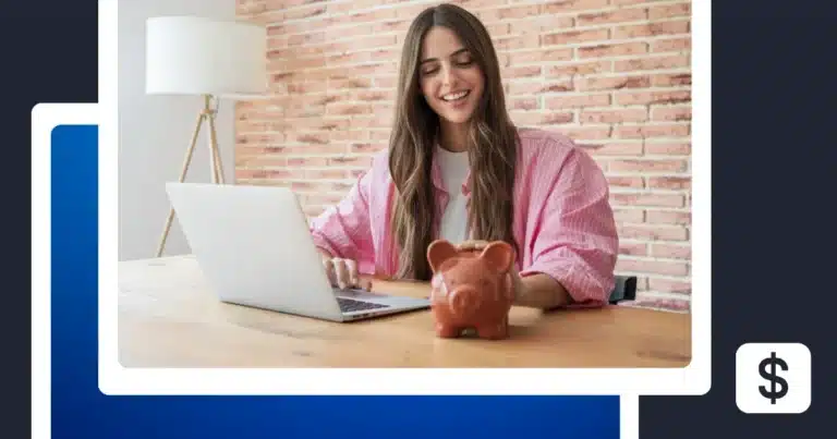 Woman using a laptop beside a piggy bank and dollar sign, representing earning money from social media.