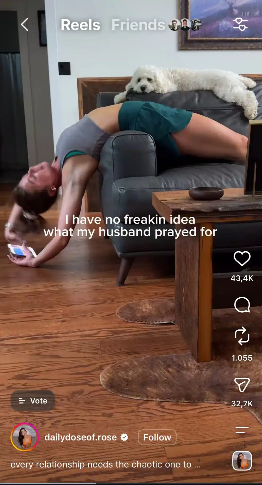 An Instagram-style Reel showing a woman humorously draped upside down over a couch while holding a phone, with a small white dog resting on the back of the couch above her. White text reads “I have no freakin idea what my husband prayed for.” The Reel interface and engagement counts appear around the image.