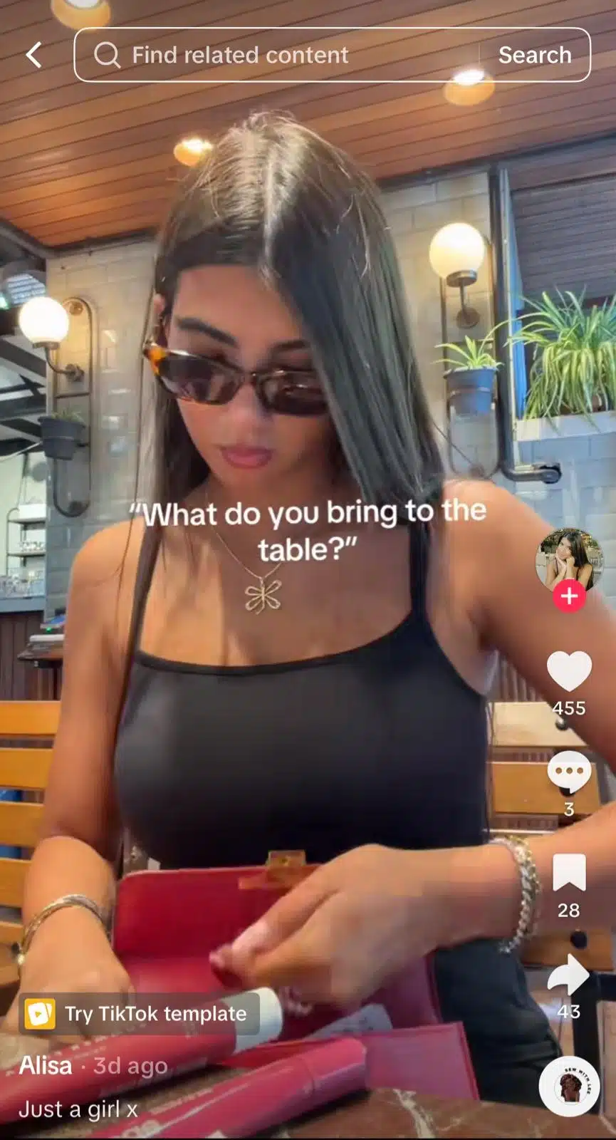 TikTok video showing a woman sitting at a restaurant with text reading, “What do you bring to the table?”