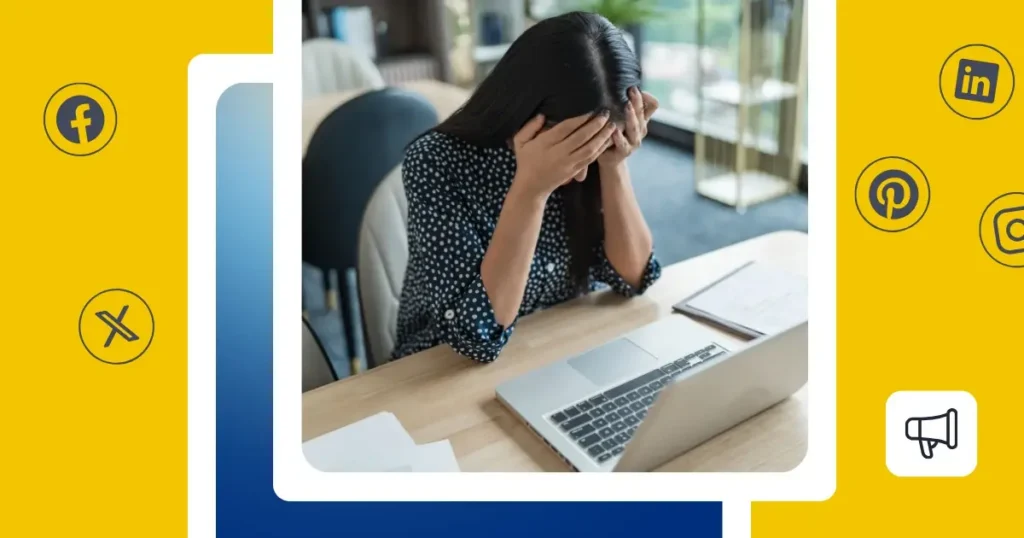 Woman sitting at a desk with an open laptop, covering her face with both hands. The photo is framed by a bright yellow background featuring Facebook, Instagram, LinkedIn, Pinterest, and X logos, alongside a megaphone icon.