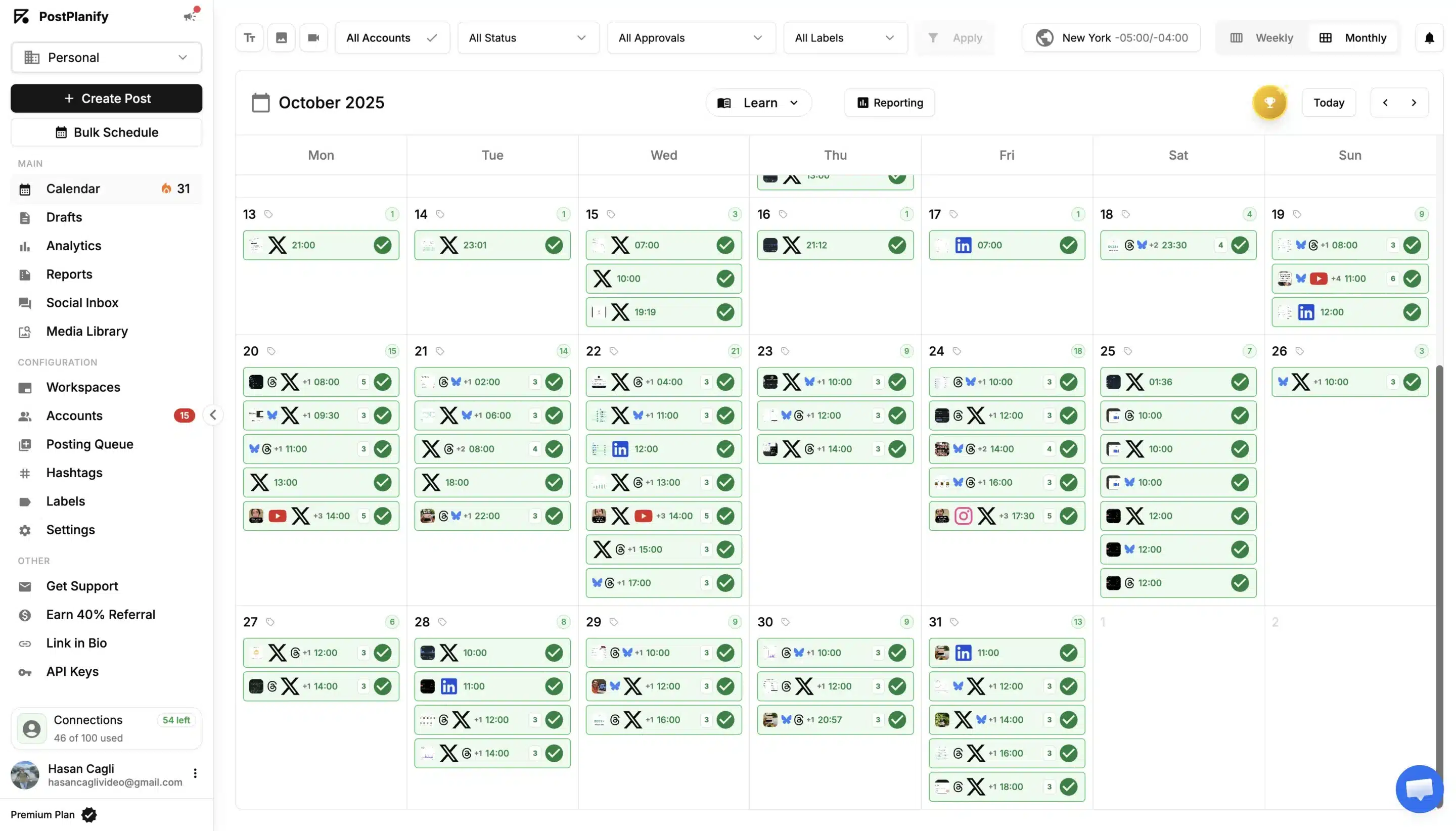 PostPlanify social media scheduling dashboard displaying a monthly content calendar for October 2025, with scheduled posts across X, LinkedIn, Instagram, YouTube, Threads, and Bluesky. Green post cards with checkmarks indicate published content, while the sidebar provides access to drafts, analytics, reports, social inbox, and account settings.