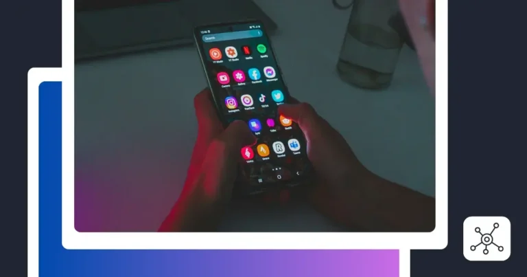 A person holding a smartphone and browsing a screen filled with social media and entertainment app icons, including Instagram, TikTok, Facebook, X, Spotify, and YouTube. The image is framed by a white border with blue and purple gradient accents against a dark background.